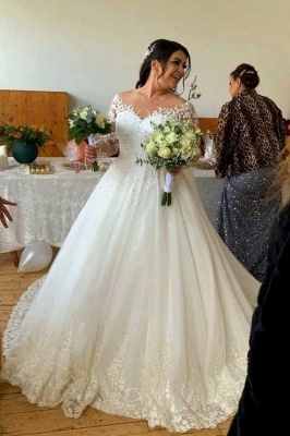 Robe de mariée trapèze à manches longues et décolleté en cœur avec tulle et dentelle_2